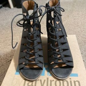 Black zipper, lace up sandals